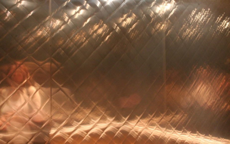 Quilted Copper lined walls in the elevator in the Art Gallery of Ontario