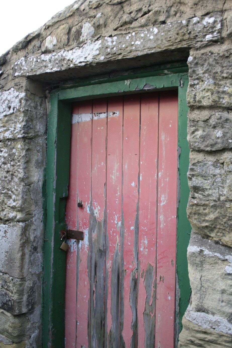 Red painted door in Warkworth